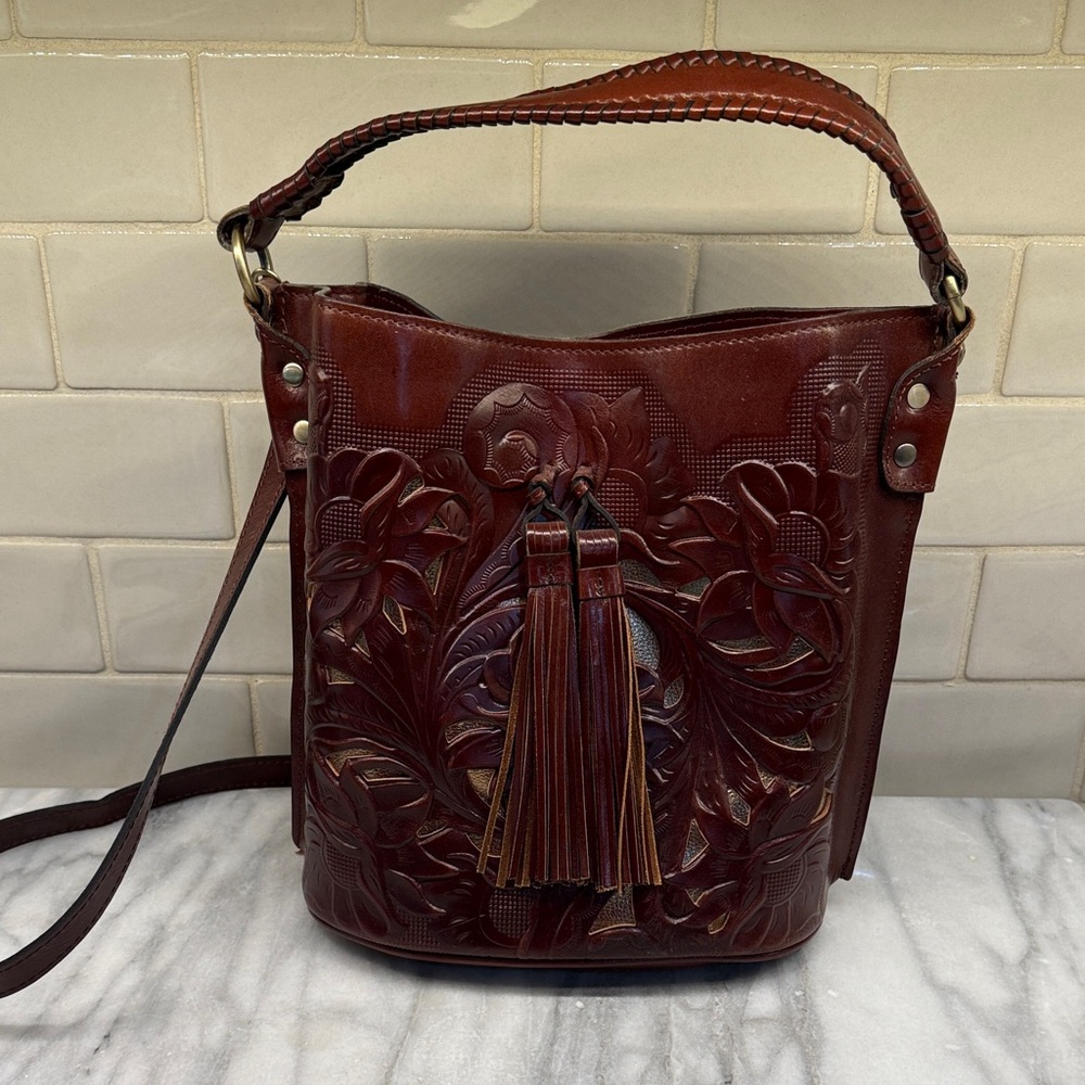 Patricia Nash Rich Brown Embossed Shoulder Bag handbag is in a western style